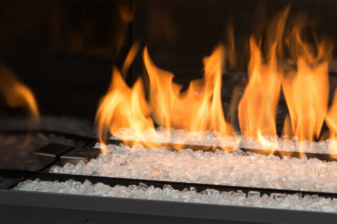 Gas fireplace ignition types, close up of pilot cover